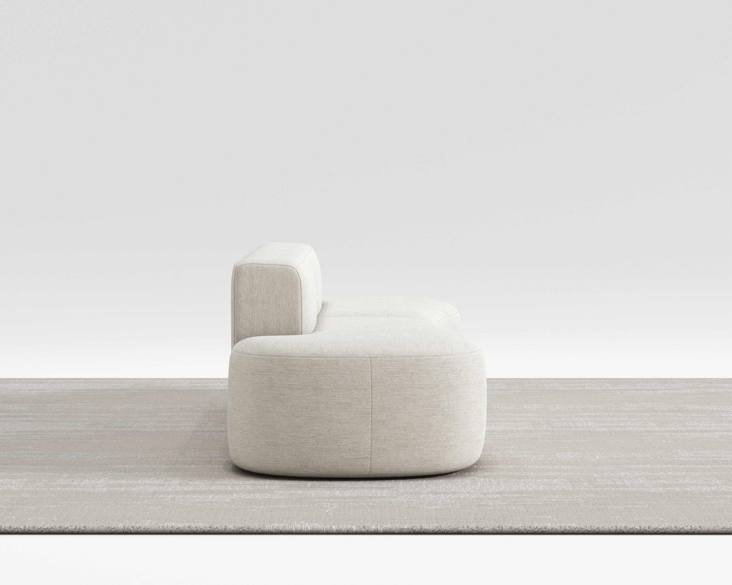 Milli Sofa with sleek curved design showcasing modern style and premium comfort, ideal for flexible room arrangements.