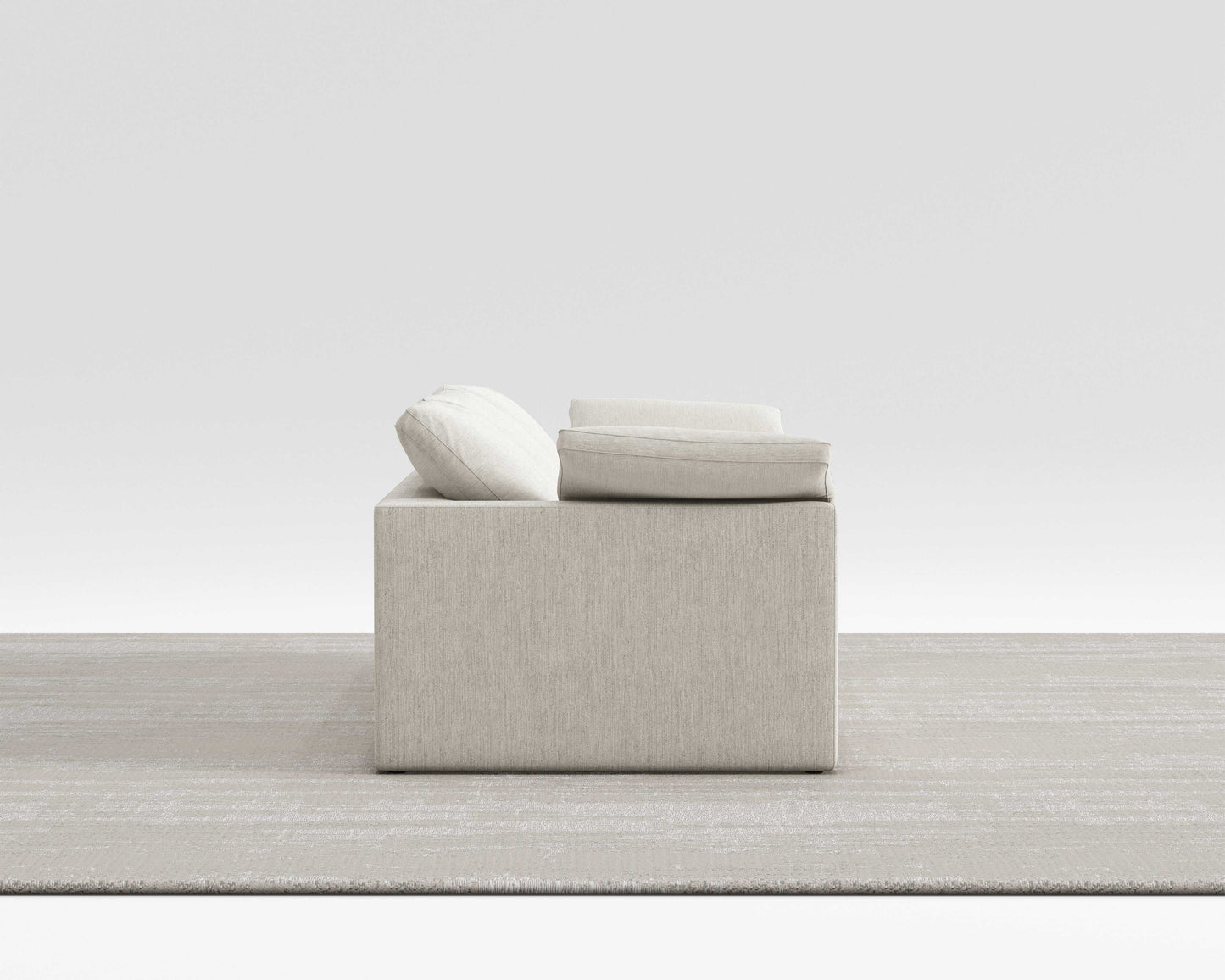 Cloud Sofa with breathable cotton-linen fabric and modular design on a neutral rug.