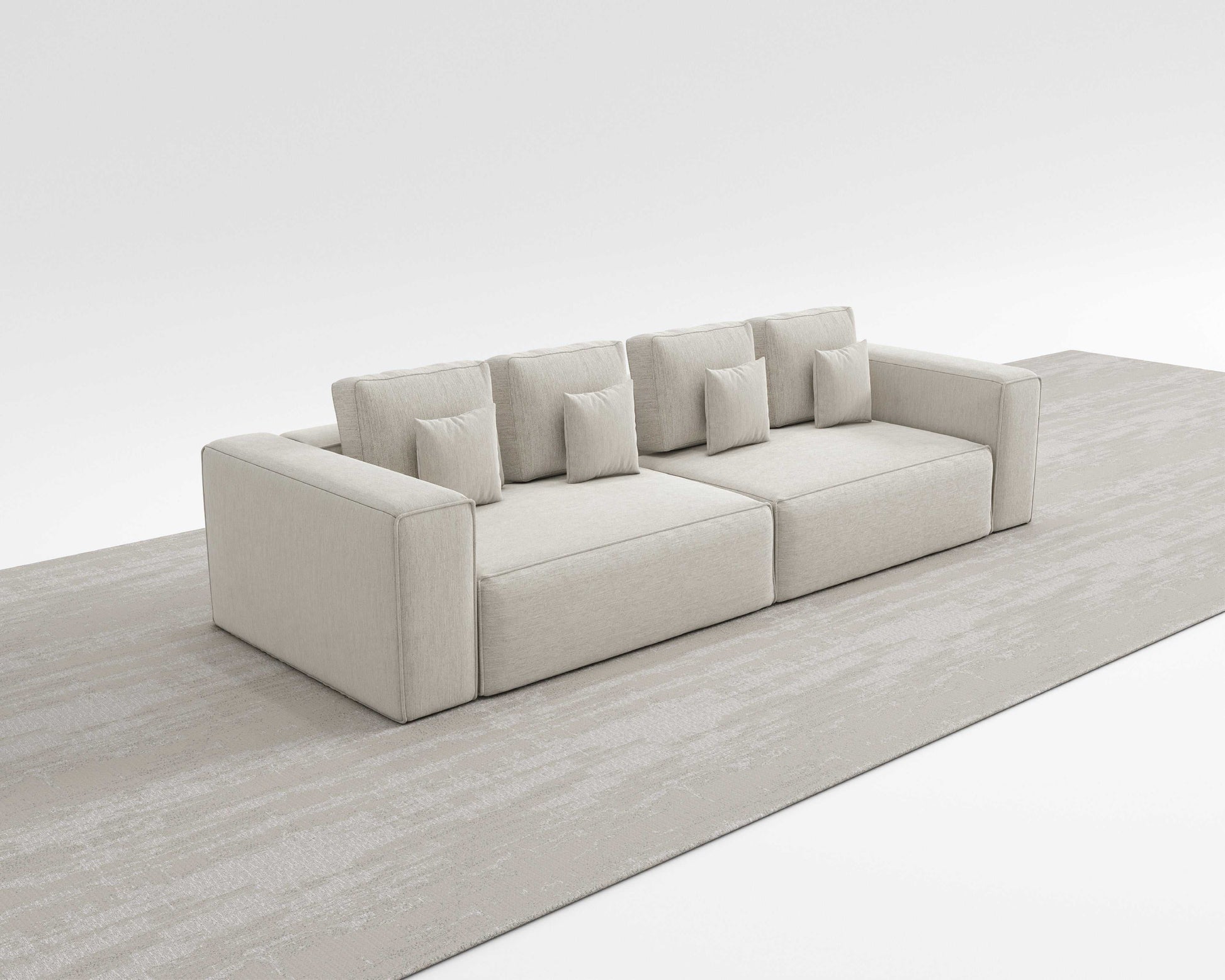 HAVEN SOFA with minimalist design and modern square pillows on a sleek carpet.