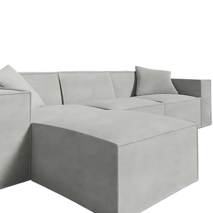 Mod Sectional in sleek low-profile design with comfy armrest pillows, vegan fabric, and innovative SmartFoam technology.