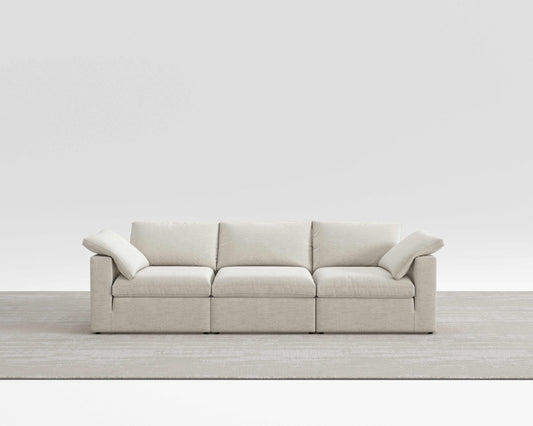 Cloud Sofa with modular design and breathable cotton-linen fabric.