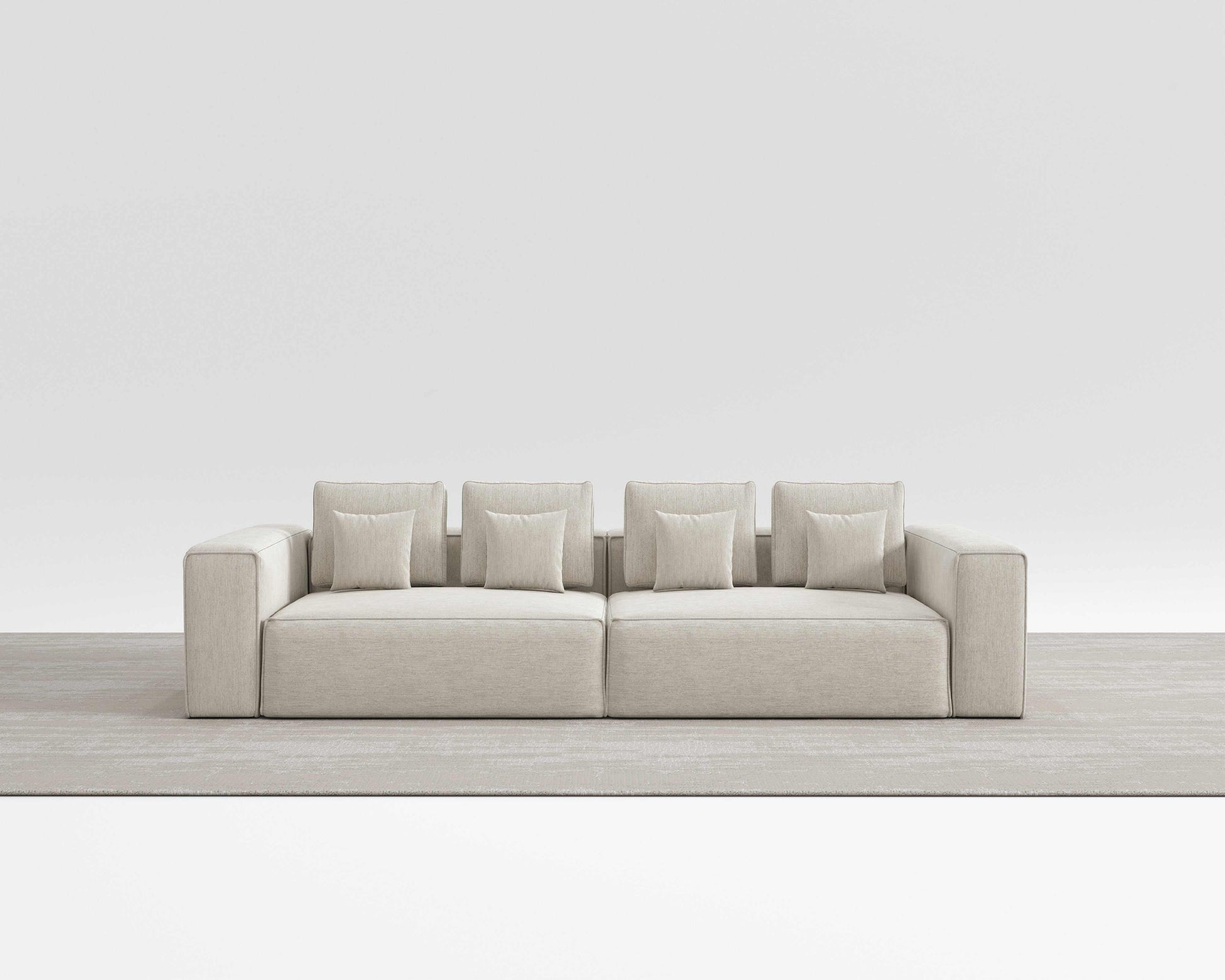 Modern HAVEN SOFA with minimalist design, sleek lines, and square pillows in a neutral setting.
