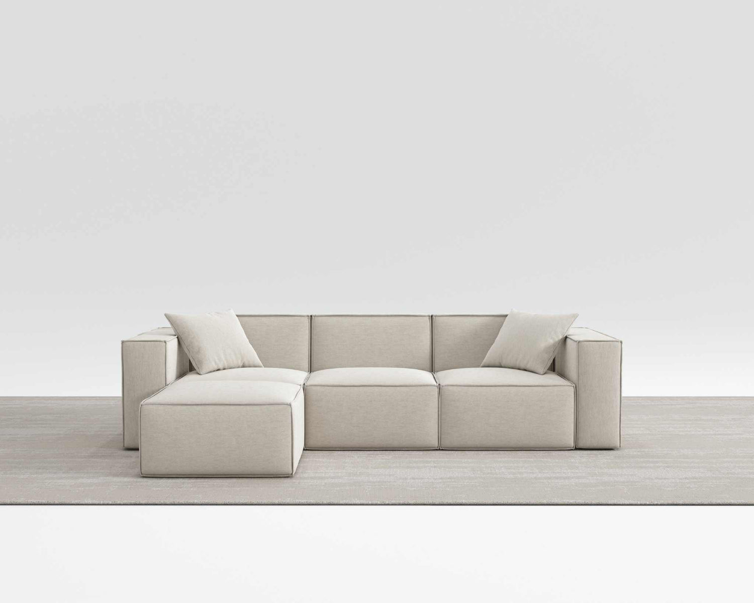 Modern Mod Sectional sofa in beige vegan fabric with armrest pillows.