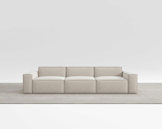 Modular Nest Sofa with double-seat tofu block design in neutral color.