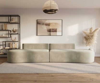 Milli Sofa with sleek curved design in modern living room.