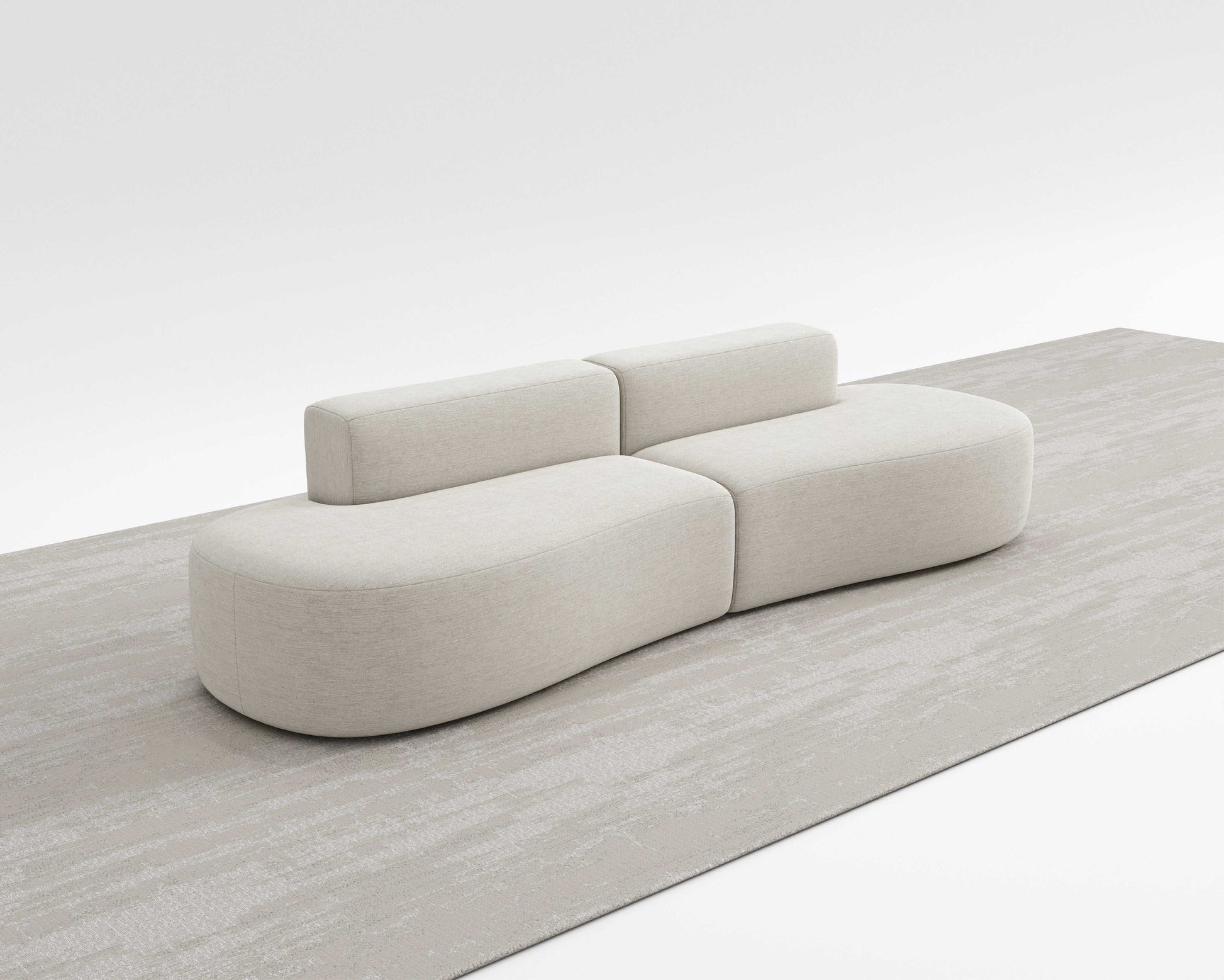 MILLI SOFA – modern curved modular sofa with premium comfort in a neutral color.