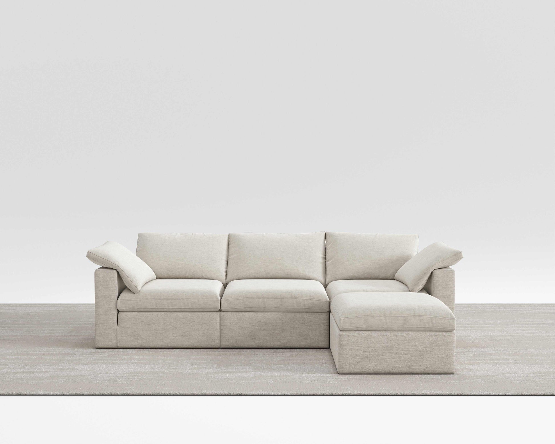 Cloud Sectional sofa with modular design and soft cotton-linen fabric on a neutral rug.