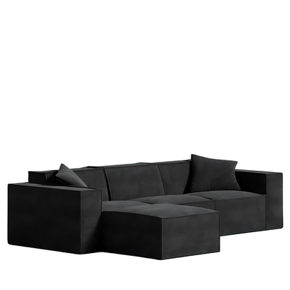 Mod Sectional sofa in sleek black, showcasing low-profile design and comfy armrest pillows, made with vegan fabric.