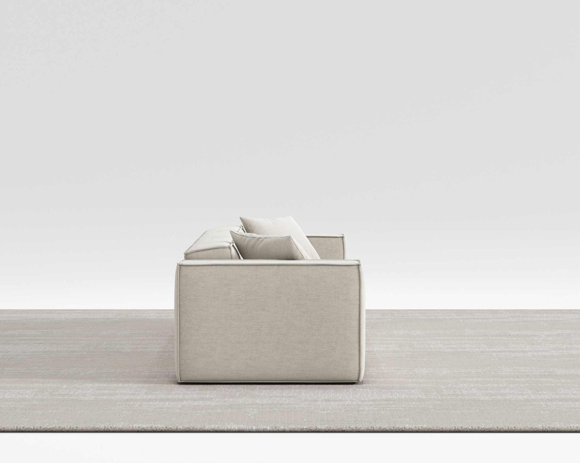 Sleek and modern Mod Sectional sofa in soft vegan fabric with armrest pillows.